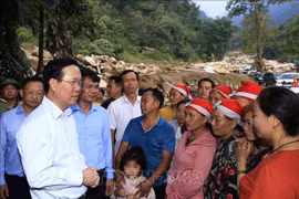 President visits families affected by flash flood in Lao Cai province