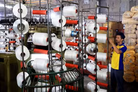 Vietnam's textile and garment industry will face many difficulties and challenges in green transformation. (Photo: VNA)