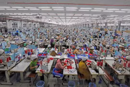Production at SCAVI Hue in Thua Thien - Hue province. The S&P Global Vietnam Manufacturing Purchasing Manager’s Index (PMI) rose sharply to 54.7 in June from 50.3 in May. (Photo: VNA)