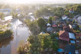Part of Mai village in Luang Namtha district, Luang Namtha province, Laos, is flooded after downpour triggered by Typhoon Yagi. (Photo: VNA)
