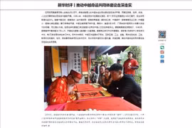 The commentariy published by Xinhua News Agency on August 21. (Photo: VNA)