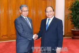 PM urges measures to bolster trade with Malaysia