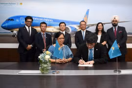 At the signing ceremony (Photo: VNA)