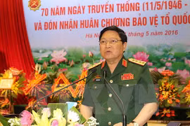Defence minister pays official visit to Laos, attends ADMM-10