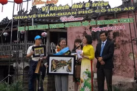 Ancient town welcomes eight-millionth visitor 