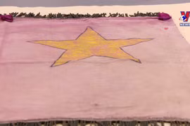 National flag crafted by OVs in Paris on first National Independence Day
