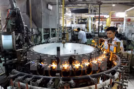 Industrial production expands by 7.4 percent in 9 months 