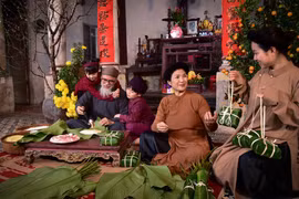 Vietnamese people preserving cultural values of traditional Tet