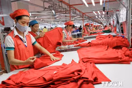 Vietnamese exports of textiles and garments (Photo: VNA)