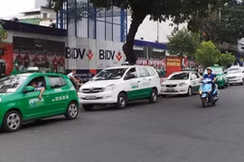 The HCM City Taxi Association, members of which have been hit by the expansion of Uber services, asked for an urgent solution to the new competitor. — Bizlive
