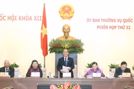 NA Chairman Nguyen Sinh Hung (middle) at the 32nd session of the NA Standing Committee. (Photo: VNA)