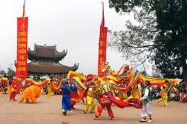 Artists perform a dragon dance at the Do Temple Festival.