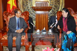 NA Vice Chairwoman Tong Thi Phong received Lao Justice Minister. (Photo:VNA) 