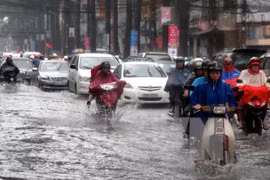 A number of streets in HCM City are flooded by rains (Photo: VNA)