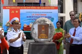 At the hand-over ceremony (Photo: VNA)