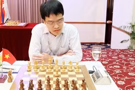 Le Quang Liem took the title at the HD Bank Cup International Open Chess tournament in HCM City yesterday.(Photo thanhnien.com.vn)