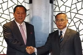 Wi Sung-lac and his counterpart Ri Yong-ho (Source: Reuters)