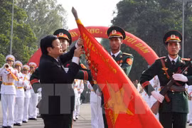 State President Truong Tan Sang presents Ho Chi Minh Order to Army Officer School I (Source: VNA)