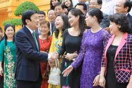 President Truong Tan Sang meets with exemplary entrepreneurs in Hanoi on Oct. 11 (Photo: VNA)