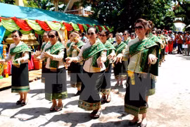 Lao people in the New Year festival (Photo: VNA)