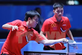 Vietnamese duo Tuan Quynh and Anh Tu at the semi-final match. (Photo: VNA)