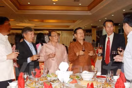 Participants at the get-together. (Photo: Vietnamplus)