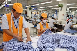 An export garment production line (Photo: VNA)