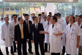 Deputy Prime Minister Vu Duc Dam, senior Party and Government officials, and delegates from the World Health Organisation, World Bank and the European Union attended (Photo: VNA)
