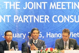 Minister of Natural Resources and Environment Nguyen Minh Quang at the meeting (Photo:VNA)