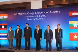 Participants at the meeting (Source: VNA)