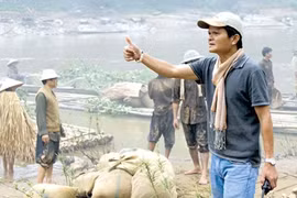 Director Nguyen Thanh Van on the set of Song Cung Lich Su (Living with History). The movie will be screened free of charge from April 26 to 30 at the National Cinema Centre. — File Photo