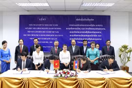 Vietnam, Laos foster cooperation in social science