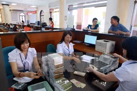 Vietnam, Laos finance ministries foster cooperation