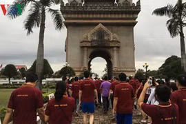 Laos holds walk to mark 49th anniversary of ASEAN