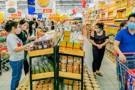 As Tet approaches, customers in mood to spend