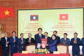 Lai Chau fosters partnership with Lao localities