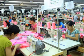 Textiles production in Vietnam. (Photo: VNA)