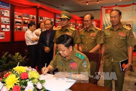 Exhibition on Laos, Vietnam police cooperation opens in Laos