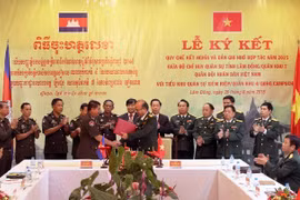 Vietnamese, Cambodian localities beef up military ties