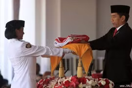 Indonesia's original national flag paraded for first time 