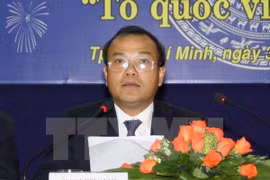 Vietnam, Laos foster links in expatriate-related work 