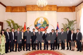 Lao leader lauds procuracy cooperation with Vietnam 
