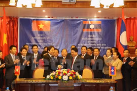 Vietnamese, Lao home affairs ministries boost cooperation 