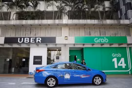 Singapore investigates Grab-Uber merger 