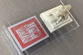 Hue exhibits royal items carved with dragons, phoenixes