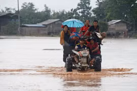 Laos temporarily bans activities in broken dam’s vicinity