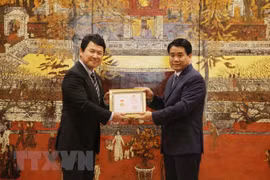Japanese deputy ambassador honoured with Hanoi’s insignia