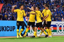 Malaysia enter Suzuki Cup’s final after gripping draw with Thailand