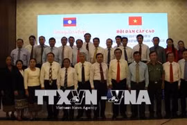 Quang Tri, Lao border province review cooperation