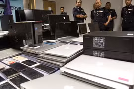 Malaysian police bust major phone swindle ring